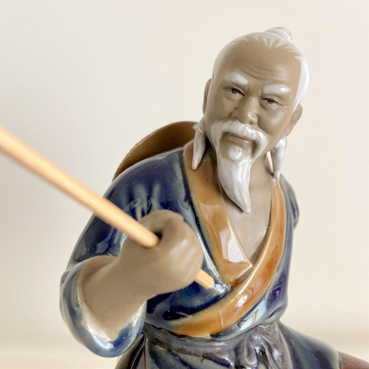 Chinese fisherman figurine – B&G Plants and Pottery